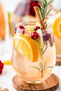 Sweet White Christmas Sangria is an easy alcoholic beverage made with dry white wine, brandy, peach cranberry juice, spices and fruit. It's perfect for all those holiday celebrations or sipping on while baking your favorite Christmas Cookies! Turn your favorite white wine into just the right balance of crisp, fruity and slightly sweet sangria. White Christmas Sangria, Christmas Sangria Recipes, Cranberry Sangria, Homemade Sangria, Sangria Drink, Winter Sangria, Holiday Sangria, Christmas Sangria, White Wine Sangria