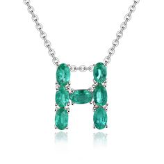 Introducing our H Initial Necklace, a delightful and personalized accessory for women. This Emerald Letter Necklace is a perfect choice for those born in May, featuring a May Birthstone Letter Pendant with gorgeous green gemstones. Crafted with care, the pendant is made from S925 Silver, weighing just 0.95 grams. The beauty of this necklace lies in the 1.57 carats of emeralds, forming a charming H shape with six oval-cut stones. This unique design adds a touch of elegance and personal flair to the piece. Whether you're looking for a thoughtful gift or a stylish addition to your own collection, the Emerald H Initial Necklace is a beautiful representation of individual style and May birthstone celebration. 💚✨ Green Round Emerald Necklace With Gemstone Accents, Green Emerald Necklace With Gemstone Accents, Round Green Emerald Necklace With Gemstone Accents, Green Gemstone Jewelry For Mother's Day, Personalized Green Birthstone Necklace In Sterling Silver, Green Sterling Silver Necklaces With Gemstone Accents, Green Gemstone Sterling Silver Necklaces, Green Gemstone Accented Sterling Silver Necklace, Emerald Necklace With Gemstone Accents For May Birthstone