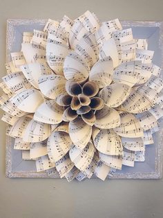 an art piece made out of sheet music