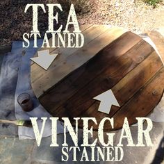 a wooden barrel sitting on top of a table next to a cup and saucer