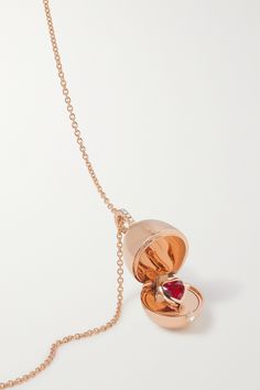 Fabergé's 'Essence' necklace is inspired by the brand's famous 'Imperial' eggs. Crafted from 18-karat rose gold, it's studded with sparkling brilliant-cut diamonds and opens to reveal a heart-shaped Mozambican ruby sourced from a Gemfields mine - the brand supports local communities and works with conservation NGOs in Africa to minimise environmental impact. Luxury 14k Gold Jewelry With Detachable Pendant, Luxury Rose Gold Oval Pendant Jewelry, Luxury Rose Gold Jewelry With Detachable Pendant, Luxury 14k Rose Gold Gemstone Jewelry, Luxury Rose Gold Oval Necklace, Luxury Oval Rose Gold Necklace, Formal Rose Gold Jewelry With Detachable Pendant, Formal Locket Necklace In Fine Jewelry Style, Formal Fine Jewelry Locket Necklace