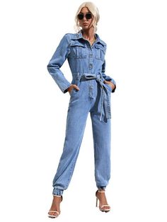 Upgrade your wardrobe with our Casual Slim Fit Denim Jumpsuit. Made with high quality denim for a comfortable and stylish fit. Perfect for any casual occasion, this jumpsuit features a slim fit design that enhances your curves while providing a versatile and fashion-forward look. Elevate your style game with this must-have piece. Trendy Denim Blue Jumpsuit For Spring, Denim Blue Overall Jumpsuit For Spring, Denim Blue Cotton Jumpsuits For Fall, Denim Blue Cotton Jumpsuits And Rompers For Fall, Trendy Dark Wash Cotton Jumpsuits And Rompers, Trendy Denim Blue Overalls For Fall, Non-stretch Medium Wash Denim Jumpsuit, Trendy Cotton Dark Wash Jumpsuits And Rompers, Trendy Denim Blue Jumpsuits And Rompers For Spring