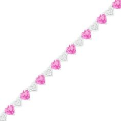 Radiate in vibrant color with this heart fashion bracelet. Created in sterling silver, this design features 5.0mm heart-shaped lab-created bright pink sapphires alternating with shimmering lab-created white sapphire clusters within polished heart-shaped frames. Buffed to a brilliant luster, this 7.25-inch link bracelet secures with a lobster claw clasp. Pink Heart-shaped Sterling Silver Bracelets, Pink Heart-shaped Sterling Silver Bracelet, Pink Heart Bracelet With Heart Charm, Pink Heart Charm Bracelet, Heart Cut Sterling Silver Bracelet For Valentine's Day, Valentine's Day White Gold Heart Cut Bracelet, Heart Cut Tennis Bracelet For Valentine's Day, Pink Bracelets For Anniversary On Valentine's Day, Pink Heart Bracelet For Valentine's Day Anniversary