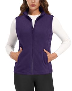 PRICES MAY VARY. Antistatic Fabrics: Made of all polyester fiber, it is very soft, lightweight, warm, also has an anti-static function. 4 Pockets: Women's fleece zip vest has 2 side zippered pockets and 2 inner pockets, provide more storage space and keep items secure. Stand-up Collar: Smooth full zipper easy to put on and take off, stand-up collar design is more windproof and warm. Elastic Armholes: Womens sleeveless jacket vest has added elastic cords at the sleeve cuffs for more inclusiveness Purple Vest Outfits For Women, Sleeveless Jackets For Women, Sports Office, Soft Vest, Office Outdoor, Jacket Vest, Outerwear Vest, Sleeveless Jacket, Fleece Vest