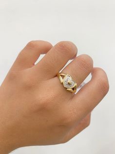 -14k Heart Ring  - 100% Gold  -Size 7  - Yellow gold  -Cubic zirconia  -Item sold by piece. Weight undetermined. Heart Ring With Diamond Accents And Cubic Zirconia, Cubic Zirconia Heart Ring With Brilliant Cut For Promise, Gold Diamond Heart Ring For Valentine's Day, Heart-shaped Yellow Gold Jewelry With Center Stone, Heart Shaped Yellow Gold Jewelry With Center Stone, Yellow Gold Cubic Zirconia Couple Rings As Gift, Heart Ring With Vs Clarity Cubic Zirconia For Promise, Gold Heart Ring With Diamond Accents Cubic Zirconia, Promise Heart Ring With Diamond Accents In Cubic Zirconia