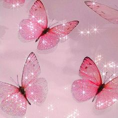 three pink butterflies flying in the sky with white stars on it's back ground