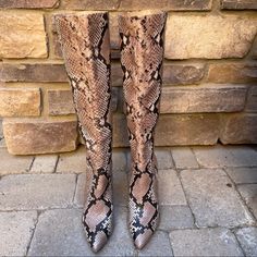 Make A Style Statement With The Steve Madden Kinga Knee High Boot. It's A Knee-High Boot Set On A Stiletto Heel, And Is Designed With A Pointed Toe And An Embossed Synthetic Upper. Color Snake Print Brown. Size Us 6 Women’s. Condition Is New Without Tags Or Box. Pull-On Styling. Synthetic Lining. Lightly Padded Footbed. Wrapped Heel. Fitted Snake Print Boots For Spring, Fitted Snake Print Spring Boots, Wrap Heels, Walk This Way, Steve Madden Shoes, Snake Print, Shoes Heels Boots, Knee High Boots, Knee High