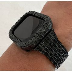 Fits the Apple Watch available for sizes 41mm or 45mm in series 7. Men's & Women's. This beautiful Black Apple watch band is high on the bling with a stainless steel band that features rows of high quality lab diamonds Add the matching bezel for an over the top Holiday Party Accessory. Exclusive Iwatch Candy Design. ⚬ Fits wrist sizes 5.5" to 8" ⚬ Classic butterfly closure. ⚬ Comes with an easy to use link removal tool and instructions. Add the Apple Watch Bezel or select a different style from Black Apple Watch Band, Black Apple Watch, Holiday Party Accessories, Candy Design, Ceramic Watch, Iwatch Apple, Black Apple, Rose Gold Band, Black On Black