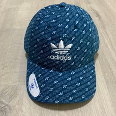 Nwt Womens Fit Strap Back Adjustable Osfm Trendy Blue Hats With Embroidered Logo, Casual Blue Hats With Embroidered Logo, Trendy Snapback Hat With Logo, Sporty Blue Dad Hat With Embroidered Logo, Trendy Blue Baseball Cap With Embroidered Logo, Casual Curved Visor Hat With Logo Print, Trendy Adidas Baseball Cap, Casual Adidas Curved Bill Hats, Blue Embroidered Logo Dad Hat