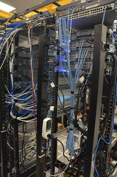 the inside of a server room with many wires