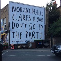 a large sign that says nobody really cares if you don't go to the party