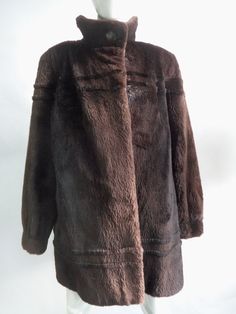 "BEAUTIFUL BROWN SHEARED BEAVER FUR JACKET FOR WOMEN. IT IS ACCENTUATED WITH HORIZONTAL FUR DESIGN AROUND THE CHEST AND THE BOTTOM.   IT HAS A MAO STYLE COLLAR, BRACELET CUFFS AND TWO SIDE POCKETS. IT CLOSES WITH FRONT HOOK &EYE CLOSURES. THE ITEM IS BRAND NEW. MEASUREMENTS:   LENGTH:  32\" SLEEVE: 31\" LONG ; MEASURED FROM THE SIDE OF THE NECK TO BOTTOM WITH ARM SIDE TO THE BODY.. CAN BE ADJUSTED IF NEEDED SIZE: 8 MEDIUM AFTER BUYING THIS ITEM, IT WOULD BE VERY MUCH APPRECIATED IF YOU COULD PRO Beaver Fur Coat, Coats Jackets Women, Fur Jacket, Montreal, Vest Jacket, Coats For Women, Fur Coat, Blue And Purple, Coats Jackets