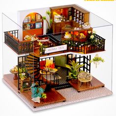 a doll house is shown with furniture and accessories