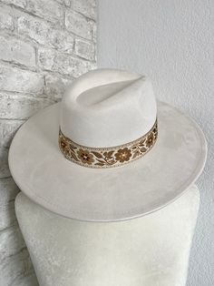 We love this hat, perfect white hat with a matching ivory+neutral flower woven band! It has a drawstring on the inside if you need to adjust it and make it a little smaller. The fabric material is a soft faux suede that is on the stiffer side! The width of the brim on the hat itself is 3.5" wide. The circumference of the inside of the hat is 22.5” but is adjustable with the drawstring interior and you can make it smaller. Fabric is 100% Polyester. Hand wash only. Bride Headband, Flower Band, Headband Tiara, Jewelry Candles, White Hat, Scarf Hat, Backpack Tote Bag, Wide Brimmed Hats, Dress Jewelry