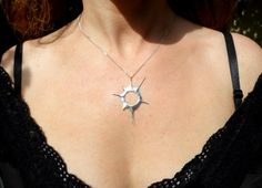 "The mysteries of our solar system always get our imagination aroused. Watching a solar eclipse gives us this feeling of us being part of a great universe. When the moon blocks the sun it is a rare, fascinating, magical moment. I love to carry this moment around with me ----Details---- A solar eclipse pendant from solid sterling silver hand carved using the lost wax method. hole diameter: 11mm 0,43inch comes on a 18 inch/ 45cm long black sterling silver chain.If you would like a 20 inch / 50cm l Sterling Silver Jewelry With Sun Design, Unique Sterling Silver Sun And Moon Jewelry, Eclipse Jewelry, Eclipse Necklace, Eclipses Art, Moon Designs, Weird Jewelry, Eclipse 2024, Anniversary Necklace