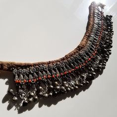 "A beautiful specimen for collector of tribal silver. This style is sometimes known as a labba mazamir and was popular with Jewish women living in Sa'ada. This piece is very old and in the original condition. Nothing has been restrung or replaced, nor has the silver been plated or dipped in a chemical acid bath for cleaning. The pendants exhibit very fine work in the filigrees with none of the shortcuts used in recent years. While you can wear it as a choker, and I've seen photos of this design Heavy Antique Silver Jewelry For Festival, Traditional Silver Metal Choker, Bohemian Antique Silver Necklace For Ceremonial Occasions, Traditional Antique Silver Jewelry, Traditional Silver Pendant Choker, Traditional Silver Tilla Choker, Ceremonial Silver Temple Necklace With Latkans, Heavy Silver Bohemian Choker, Silver Bohemian Choker For Ceremonial Occasions