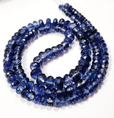 "AAAA+ Quality-Blue Sapphire Faceted Rondelle Beads Genuine Sapphire Gemstone Beads Large Rondelle Beads Full Sparkling Blue Sapphire Jewelry Item Code :   7148 Origin-:   Blue Sapphire Srilanka Grade-:  AAA Luster Sapphire  Stone shape-: Faceted Rondelle Beads Stone color-: Same As Picture  Metal           -: 925 Silver Clasp NOTE FOR BUYER:  I Will Make This Beautiful Necklace With Sterling Silver Clasp Length        -: 18 Inch Quantity-: 1 Strand Necklac Approx Weight   :  243.50 Carat   Approx Size        :   5 To 10 MM MOST BEAUTIFUL SAPPHIRE STRAND FOR JEWELRY MAKING AND GIFT FOR ANYONE. If you have any questions about this item please contact me I will get back to you as soon as ABOUT US skgemsstone based in Jaipur, India is a company engaged in supplier, manufacturing, wholesale an Blue Crystal Round Beads, Blue Beaded Necklaces With Stones For Jewelry Making, Sapphire Beaded Necklaces With Faceted Round Beads, Blue Rondelle Faceted Bead Necklace, Blue Rondelle Beaded Necklace With Faceted Beads, Blue Oval Gemstone Beads, Blue Rondelle Faceted Bead Necklaces, Blue Rondelle Beads For Jewelry Making, Handmade Blue Rondelle Beads