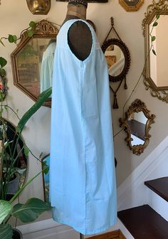 Darling vintage sky blue nightgown by Katz! No pockets, has a white lace trim along the front of the chest and embroidered flowers on the lace and 1 on the neckline. Marked a size medium. Is 65% polyester and 35% cotton. Still has wash care instructions. Overall good condition. Very minor wear. Bust: 40 inches Length: 40 and 1/2 inches Discounts offered for bulk purchases. Shop accepts PayPal, credit cards, and Etsy gift cards. ♥Check out the rest of the shop♥ https://www.etsy.com/shop/artdecoda Sleeveless Light Blue Sleepwear For Spring, Light Blue Sleeveless Sleepwear For Spring, Blue Cotton Nightgown For Spring, Light Blue Summer Nightgown For Bedtime, Blue V-neck Dress For Sleepover, Light Blue Lace Trim Dress For Loungewear, Blue Nightgown For Summer Daywear, Vintage Blue Dress For Sleepover, Blue Lace Trim Dress For Loungewear