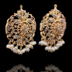 Meticulously designed to perfection! Classic pair of earrings adorned with beautiful CZ stones and pearl detailing. Approximate earrings length is 2". Gold-plated on high-quality brass as base metal. Made by order. Kindly allow 5-7 weeks for the delivery of this item. For custom or urgent requests, please contact support@alacouture.com. *Please Note: We use faux stones and beads in all of our jewelry. Unique Gift Cards, Faux Stone, Cz Stone, Base Metal, Gold And Silver, Free Gifts, Beautiful Jewelry, Silver Gold, Diamond Earrings