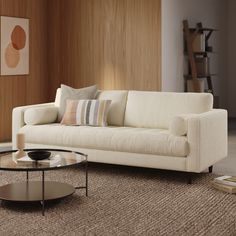 a living room scene with focus on the couch and coffee table