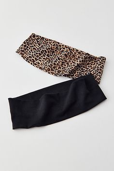 Set of two seamless headwraps in a soft and stretchy knit. Features Soft & stretchy headband set Set of two headwrap headbands Soft knit with a stretchy finish Stretch fit Includes two headbands Content + Care Set of 2 100% Modal Hand wash Imported | Soft & Stretchy Headband Set in Leopard/Black, Women's at Urban Outfitters Cheap Trendy Headband One Size Fits All, Affordable Elastic Headband, One Size Fits Most, Trendy Bandana Print Headband, Cheetah Headband, Leopard Headband, Leopard Print Headband, Stretch Headband, Head Wrap Headband, Stretchy Headbands