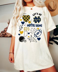 a woman wearing a t - shirt that says let's go nd not the same