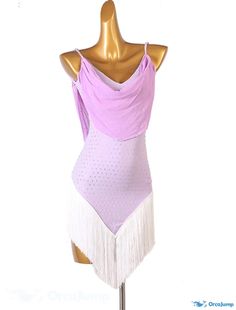 a mannequin wearing a purple leotard with white fringes