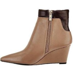 HALSTON Stunning Size-7.5 M New, two-tone Kimberly ankle boots from H by Halston. This sleek style has a trend-forward pointed toe, two-tone leather accents, and a wedge heel. Zipper closure. Style: Kimberly Pointed toe, full exterior zipper Approximate measurements: Wedge heel 2-3/4"H; Shaft 5"H; Ankle circumference 10" Fit: true to size Leather upper; man-made balance Brown High Heel Wedge Boots For Fall, Chic Brown Wedge Boots For Fall, Brown Leather Pointed Toe Wedge Boots, Modern Pointed Toe Wedge Boots For Fall, Leather Ankle-high Wedge Boots For Work, Ankle-high Leather Wedge Boots For Work, Ankle-high Wedge Boots For Workwear In Fall, Brown Wedge Heel Boots For Fall, Fall Ankle-high Wedge Boots For Workwear