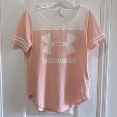 Nwt Under Armour Pink/Peachy & White Athletic Short Sleeve 3 Stripe Tee Shirt. Size Xs Under Armour Crew Neck Top With Letter Print, Under Armour Cotton Tops With Letter Print, Under Armour Sporty Tops With Letter Print, Under Armour White T-shirt With Graphic Print, Under Armour Casual Cotton Shirt, Sporty Under Armour Tops With Letter Print, Casual Cotton Under Armour Shirt, White Under Armour T-shirt With Graphic Print, Casual Under Armour Cotton Shirt