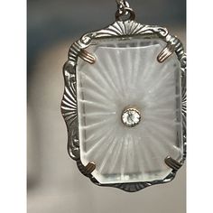 This Exquisite Vintage Art Deco Necklace Features A Stunning Camphor Glass Pendant, Beautifully Set In A Detailed Frame. The Piece Reflects The Elegance And Craftsmanship Of The Era, With Its Intricate Design And Unique Glasswork That Catches The Light. The 18-Inch Chain Complements The Pendant, Making It A Cherished Addition To Any Antique Jewelry Collection. Camphor Glass Center Ornate Frame Design 18-Inch Chain Push Clasp Closure Camphor Glass Jewelry, Camphor Glass Necklace, Vintage Art Deco Necklace, Pendant Making, Island Park, Art Deco Necklace, Glass Pendant Necklace, Ornate Frame, Glass Necklace