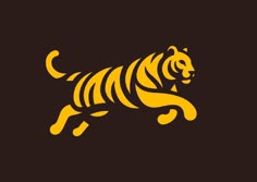 a yellow tiger running across a black background