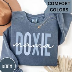 Luxurious comfort and style are what this unisex, garment-dyed sweatshirt is all about. It's made with 80% ring-spun cotton and 20% polyester and the fabric is 3-end garment-dyed, ring-spun, color-blast fleece with a 100% cotton face. Each sweatshirt comes with a relaxed fit, a rolled-forward shoulder, and a back neck patch.  .: 80% ring-spun cotton, 20% polyester .: Medium-heavy fabric (9.5 oz /yd² (322.1 g/m .: Relaxed fit .: Sewn in twill label .: OEKO-TEX certified low-impact dyes Comfortable Cotton Soft-washed Sweatshirt, Comfortable Fit Cotton Sweatshirt, Soft-washed Cotton Sweatshirt With Comfortable Fit, Casual Custom Text T-shirt For Fall, Fall Casual T-shirt With Custom Text, Casual Fall T-shirt With Custom Text, Casual Cotton Sweatshirt With Custom Print, Custom Text Sweatshirt With Relaxed Fit For Fall, Custom Text Casual Sweatshirt For Fall