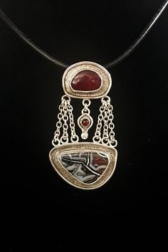 Sterling Silver Australian Boulder Opal and Rosarita Red Pendant classic pendant Silver Fusion Necklace With Cabochon, Artisan Red Jewelry With Large Pendant, Red Sterling Silver Jewelry With Polished Finish, Artisan Red Jewelry For Anniversary, Red Jewelry With Large Oval Pendant, Artisan Red Jewelry For Collectors, Collectible Red Jewelry With Polished Finish, Red Polished Finish Collectible Jewelry, Artisan Red Collectible Jewelry