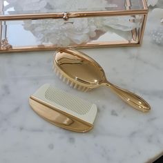 Silver or Gold plated baby hair brush set, which comes in a box. The brush can be personalised on the back with 1-2 initials. This is a baby brush and comb with soft bristles. Please ensure your details are correct before placing the order, as no proof will be sent for this item. Please leave a note at checkout if you would like initials on the set. This baby hair brush set is the perfect gift to pair with our silver or gold comb rattle or trinket box. This is an ideal small gift for the special communion, baptism child or any child for keepsake It comes in 2 colours Silver Gold Let me help you find the perfect gift. Please chat, email us at info@minitreasurekids.com or call us at +61 3 9939 7598 Rush orders are available at checkout. Baby Hair Brush, Brush And Comb, Hair Brush Set, Hair Supplies, Special Occasion Jewelry, Jewelry Candles, Sell Gold, Keepsake Jewelry, Box Making