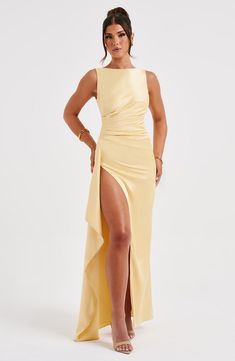 More-is-more with the Peggy maxi, a flirty dress made in sleek, body-hugging satin with stretch. With a high, wide neckline and low scoop back, this maxi has a draped thigh high split and removable corsage to the shoulder with frill detailing. Wear yours with loose waves and metallic heels. 



Colour: Lemon.

Luxury stretch satin.

Fully lined.

Body hugging fit.

High, wide neckline.

Low scoop back.

Asymmetric pleats to waist.

Removable corsage with frill details.

Draped thigh high split. Long Skirt Elegant, Backless Satin Dress, Party Dress Club, Elegant Evening Wear, Skirt Elegant, Strap Dresses, Maxi Dress Sale, Long Bodycon Dress, Flirty Dresses