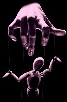 a hand reaching for an object in the air with strings attached to it, as if they were puppets