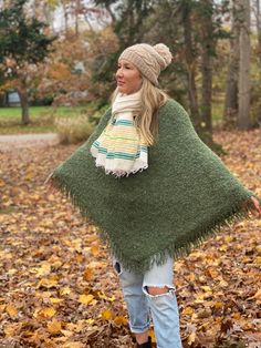 BoBo Hand Knit Baby Alpaca Fringe Poncho- Yosemite An ultra chic poncho for any season made out of the most sustainable wool on the planet. Baby Alpaca is the softest! This poncho is hand knit from baby Alpaca yarn by our artisans in Peru, only natural dyes are used here. A BoBo GloBal Design produced in collaboration with our artisan partner in Cusco, Peru. A traditional poncho silhouette with a fringe detail along the hem. A perfect layering piece to style over jeans, leggings, a dress, or a s Alpaca Poncho, Cusco Peru, Fringed Poncho, Alpaca Fiber, Alpaca Yarn, Global Design, Jeans Leggings, Baby Alpaca, Alpaca Wool