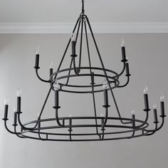 a black chandelier hanging from the ceiling