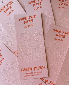 wedding save the date cards in pink and orange