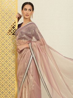 Lavender sareeSolid saree with embroidered borderHas sequinned detailThe saree comes with an unstitched blouse pieceThe blouse worn by the model might be for modelling purpose only. Check the image of the blouse piece to understand how the actual blouse piece looks like. Festive Purple Saree With Embroidered Border, Purple Saree Blouse Piece With Embroidered Border, Purple Chanderi Blouse Piece With Embroidered Border, Purple Saree With Embroidered Border For Diwali, Bollywood Style Purple Blouse With Embroidered Border, Designer Purple Dupatta With Embroidered Border, Party Wear Pre-draped Chanderi Saree With Embroidered Border, Purple Saree With Embroidered Border For Festivals, Eid Purple Blouse Piece With Embroidered Border