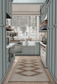 a kitchen with blue cabinets and wooden floors is shown in this artist's rendering