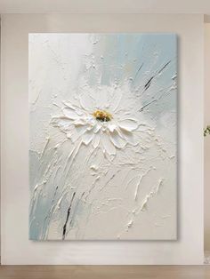 an abstract painting with white and yellow flowers