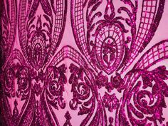 pink and black wallpaper with an intricate design on the back side, in shades of purple