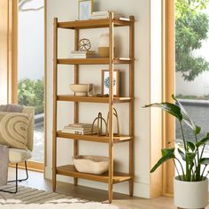 a living room with a book shelf filled with books