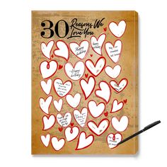 a notebook with hearts on it and the words 30 reason we love you