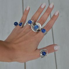 ❀ I made this blue evil eye Ring for you, to make you look elegant. A Long Ring that can fit perfectly to all styles. You will look elegant when you wear this Protection ring. dome evil eye ring stands out with flashy designs. If you have a modern and rebellius style, this luck ring is for you. ❀ It is an Adjustable ring with sterling silver plated matte finish. ❀ All the rings are adjustable in the back. Rings are easy to adjust and would fit fingers size US 4 and up ❀ If you are looking for a Blue Open Ring Metal Ring, Blue Open Ring Made Of Metal, Blue Metal Open Ring, Blue Open Ring Metal Jewelry, Blue Metal Open Ring Jewelry, Elegant Blue Metal Rings, Nickel-free Blue Open Ring Jewelry, Handmade Blue Open Ring Jewelry, Adjustable Sterling Silver Evil Eye Ring