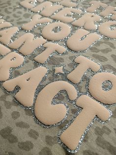 the letters are made out of foam and sequins