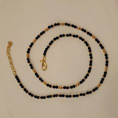 Beautiful Black And Gold 24" Necklace By Bellezza. In Preowned But Unworn Condition, So Nwot (New Without Tags). Made In Italy (Itaor). Faceted Black Spinel Beads With Gold Beads Shimmer! Lobster Claw Clasp. Measures 24" Plus 2.5" Extender. Elegant Black Necklace With Gold Beads, Elegant Black Necklaces With Gold Beads, Elegant Black Beads With Gold Details, Adjustable Black Necklace With Gold Beads, Black Beaded Necklace With Gold Beads For Party, Black Necklaces With Round Gold Beads, Black Single Strand Beaded Necklaces For Party, Black Single Strand Beaded Necklace For Party, Black Single Strand Necklace For Party