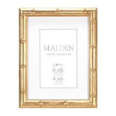 a golden frame with the name maiden on it and measurements for each item in front