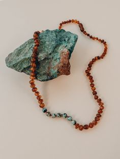 Our jewelry is handmade using original Baltic Sea Amber that is over 45 million years old. Baltic Amber has some of the highest concentrations of Succinic Acid found in nature and this is what makes it so special. Fossilized tree sap that has been preserved for millions of years under the sea. It is a true gift from Mother Nature. The string on each of our necklaces and bracelets is knotted by hand in between each and every bead, so should the necklace break (which it should if necessary), the r Tree Sap, Baltic Amber Necklace, Amazonite Necklace, Teething Necklace, Jasper Necklace, Amber Bracelet, Amber Necklace, Healing Jewelry, Baltic Sea